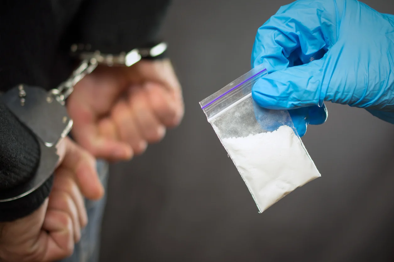 A police officer finds drugs during a search 